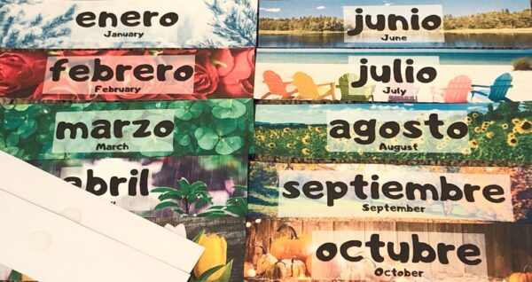 RoShamBo Homeschooling circle time board in Spanish and English month banners